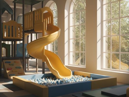 햇살 드는 실내 놀이터, 미끄럼틀과 볼풀장, 창문 너머 나무